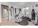 Converted room featuring barber's chair, equipment, and view to another room at 6814 W Berkeley Rd, Phoenix, AZ 85035