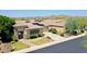 Aerial view of a home in a desert community with well-maintained landscaping at 6886 W Mazatzal Dr, Peoria, AZ 85383