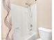 Clean bathroom features a shower-tub combination with white tile and modern fixtures at 6886 W Mazatzal Dr, Peoria, AZ 85383