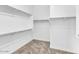 Walk-in closet equipped with shelving and ample storage space at 6886 W Mazatzal Dr, Peoria, AZ 85383