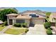 Charming single-story home featuring desert landscaping, stone accents, and solar panels at 6886 W Mazatzal Dr, Peoria, AZ 85383