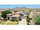 Charming single-story home with desert landscaping, solar panels, and mountain views at 6886 W Mazatzal Dr, Peoria, AZ 85383