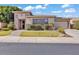 Charming single-story home featuring desert landscaping, stone accents, and a two-car garage at 6886 W Mazatzal Dr, Peoria, AZ 85383