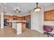 Beautiful kitchen featuring stainless steel appliances, granite countertops, and custom wood cabinetry at 6886 W Mazatzal Dr, Peoria, AZ 85383