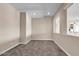 Spacious living room featuring neutral walls, carpet, and recessed lighting at 6886 W Mazatzal Dr, Peoria, AZ 85383