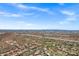 Vast aerial view showing the desert community with highways, golf courses, and mountain scenery at 7134 E Sandia St, Mesa, AZ 85207