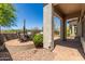 Inviting backyard patio with built-in seating and desert views at 7134 E Sandia St, Mesa, AZ 85207