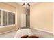 Cozy bedroom with a window and a closet at 7134 E Sandia St, Mesa, AZ 85207
