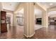 Welcoming entryway transitioning into the living room, kitchen, and dining areas at 7134 E Sandia St, Mesa, AZ 85207