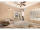 Living room featuring plush carpets, a chandelier, and a view to another room at 7134 E Sandia St, Mesa, AZ 85207