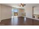 Hardwood floors and natural light complement this spacious upstairs bonus room at 7421 S 25Th Ln, Phoenix, AZ 85041