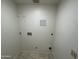 A utility room with all the necessary connections for your laundry appliances and convenient overhead rack at 8117 W Dreyfus Dr, Peoria, AZ 85381