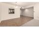 Dining area with tile flooring connects to kitchen with breakfast bar at 8301 N 21St Dr # F102, Phoenix, AZ 85021