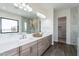 Modern bathroom with double sink vanity, neutral color palette, and tiled floors at 9626 E Bunny Ear E Ln, Gold Canyon, AZ 85118
