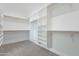 Spacious walk-in closet features custom shelving for optimal storage and organization at 9626 E Bunny Ear E Ln, Gold Canyon, AZ 85118