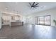 Open concept living space with fireplace, kitchen and mountain views from the sliding glass doors at 9626 E Bunny Ear E Ln, Gold Canyon, AZ 85118