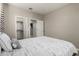 Bedroom view showing a walk-in closet and doorway at 9747 W Sands Dr, Peoria, AZ 85383
