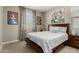 Bedroom featuring a full-sized bed and warm toned walls at 9747 W Sands Dr, Peoria, AZ 85383