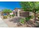 Charming single-Gathering home with a two-car garage and desert landscaping at 9747 W Sands Dr, Peoria, AZ 85383
