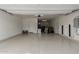 Spacious garage area to park vehicles with installed Tesla power wall batteries at 9747 W Sands Dr, Peoria, AZ 85383