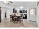 A kitchen with a breakfast bar and a door, offering natural light and access to the outdoors at 1018 S Toltec --, Mesa, AZ 85204