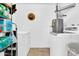 A laundry room with a washer, dryer, and shelving, offering a convenient space for laundry tasks at 1018 S Toltec --, Mesa, AZ 85204