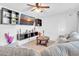Comfortable living room featuring a large wall-mounted TV and modern shelving at 1018 S Toltec --, Mesa, AZ 85204