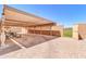 Spacious covered patio area with a brick-paved floor, perfect for outdoor entertaining and relaxation at 1018 S Toltec --, Mesa, AZ 85204