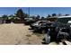 Exterior shot showing a variety of parked vehicles and the surrounding area at 1039 E Broadway Rd, Mesa, AZ 85204
