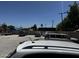 View of parking lot and parked cars from behind another car at 1039 E Broadway Rd, Mesa, AZ 85204