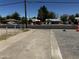 Street view of the property with vehicles parked nearby at 1039 E Broadway Rd, Mesa, AZ 85204