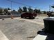 Street view with a red pickup truck parked and construction cones visible at 1039 E Broadway Rd, Mesa, AZ 85204