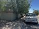 Street view of property features shade trees along sidewalk at 1039 E Broadway Rd, Mesa, AZ 85204