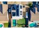 Aerial view of the property, showing solar panels, the RV parking area, pool and playground at 10822 W Quail Ave, Peoria, AZ 85373