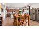 Modern kitchen seamlessly connects to the dining area, ideal for entertaining and everyday living with stainless appliances at 13123 W Cottontail Ln, Peoria, AZ 85383