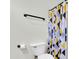 Bathroom featuring a toilet and a shower with a colorful geometric shower curtain at 1350 S Greenfield Rd # 1166, Mesa, AZ 85206
