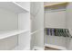 Walk-in closet featuring ample shelving, hanging rods, and organized storage for clothing and accessories at 1350 S Greenfield Rd # 1166, Mesa, AZ 85206