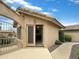 Covered patio area featuring an open doorway, providing access to the outdoor space at 14235 W Shawnee Trl, Surprise, AZ 85374