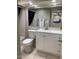 Modern bathroom with new cabinets, sink, and tiled floors at 1432 W Emerald Ave # 51, Mesa, AZ 85202