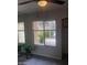 Bedroom with a view of a pool, large windows, and carpeted floors at 1432 W Emerald Ave # 51, Mesa, AZ 85202