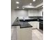 Modern kitchen with breakfast bar and ample counter space at 1432 W Emerald Ave # 51, Mesa, AZ 85202