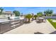 Outdoor kitchen area complete with a built-in grill and dining space at 1462 E Sweet Citrus Dr, Queen Creek, AZ 85140