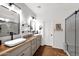 Bathroom with double sinks, walk-in shower, and modern fixtures at 1462 E Sweet Citrus Dr, Queen Creek, AZ 85140