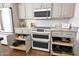 Spacious kitchen with stainless steel appliances and granite countertops at 1462 E Sweet Citrus Dr, Queen Creek, AZ 85140