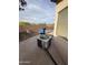 Backyard showcasing AC Unit, trash can, and partial views of field at 1546 W Vaughn Ave, Gilbert, AZ 85233