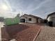 Cozy single story home with attached garage and low maintenance desert landscaping at 1546 W Vaughn Ave, Gilbert, AZ 85233