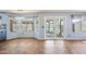 Dining room with large windows, tile floors and view of pool outside patio doors at 1638 N Avoca --, Mesa, AZ 85207