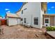 Backyard view with house, hot tub, and pool filter system at 1638 N Avoca --, Mesa, AZ 85207