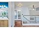 Hallway leads to bathroom and overlooks staircase at 1638 N Avoca --, Mesa, AZ 85207