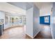 The living room boasts tile flooring and access to the backyard and an additional room at 1638 N Avoca --, Mesa, AZ 85207